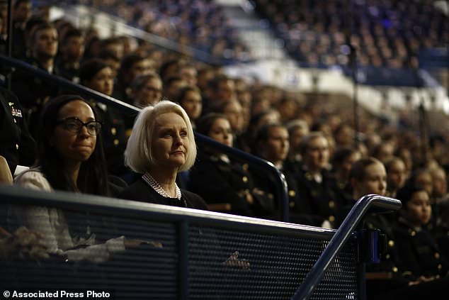 Cindy McCain, second from right, is seen in the crowd during the speech. McCain called himself an 