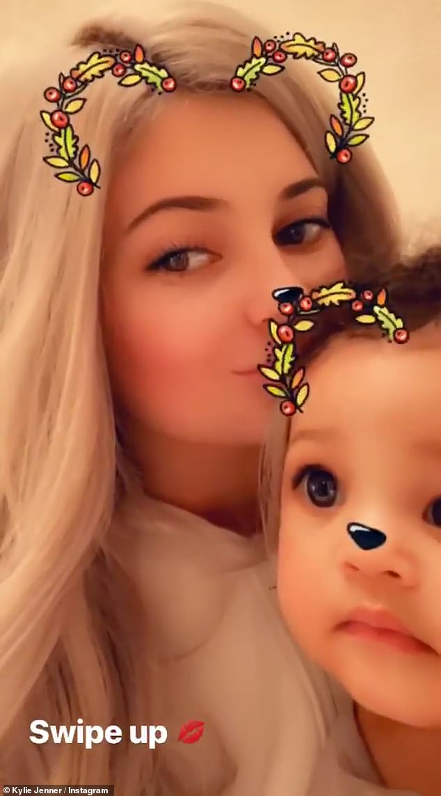 Cute: Kylie used a popular app that altered her voice and added a button nose and mni-wreaths to their faces 