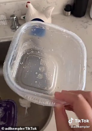 AFTER: A woman has shared her simple hack to remove oily stains from plastic containers - and it will only take you one minute, with no scrubbing required