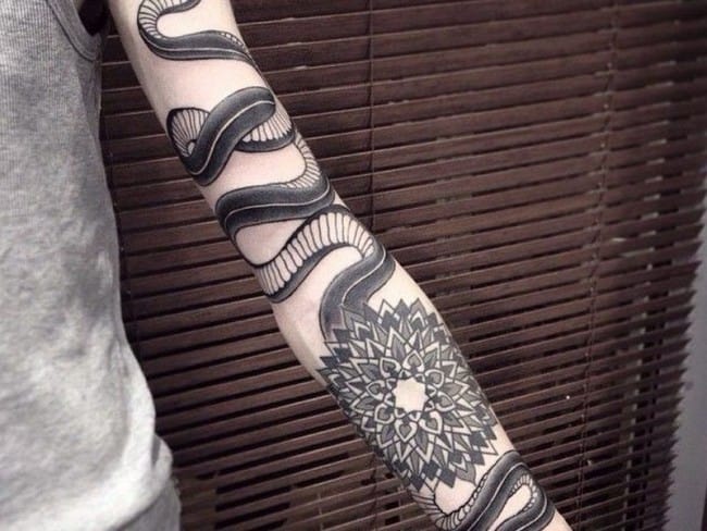 snake arm tattoo