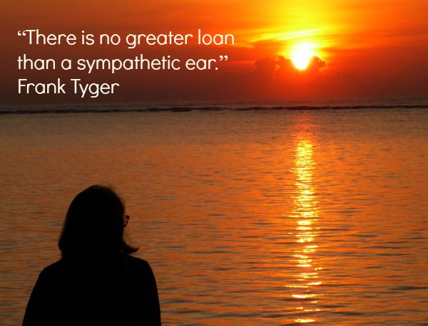 Quote - There is no better loan than a sympathetic ear.  Woman looking at the sunrise.